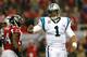 How will Cam Newton fare in his first playoff game as a professional?