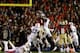 Kelvin Benjamin leaps over a sea of Auburn Tigers defenders for the game-winning score in the BCS National Championship Game.