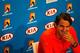 Roger Federer smiles as he contemplates faster courts in Australia this year.