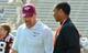 Defensive coordinator Bud Foster and linebacker prospect Raymon Minor