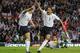 Smiles better: John Terry and Rio Ferdinand in action for England, but who is the superior player though?