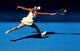 Caroline Wozniacki reaches for ball at 2014 Australian Open
