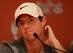Rory McIlroy faces questions about his two-stroke penalty for an incorrect drop.