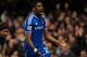 Smiles better: Eto'o celebrates his hat-trick for Chelsea against Manchester United at the Bridge on Sunday