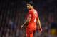 If looks could kill: Liverpool forward Suarez is still wanted by a whole host of clubs around the world after shining for the Reds so far this campaign