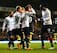 Adebayor congratulates Soldado after his goal against Stoke.