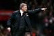 If looks could kill: Manchester United boss David Moyes shows the strain of defeat at Old Trafford on Wednesday night.