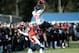 Aaron Colvin of Oklahoma (bottom) defends a pass in practice.