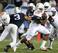 Van Noy (3) tries to tackle a Texas running back.