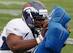 Ty Warren practices with the Denver Broncos