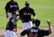 Michael Brady (84) participates in defensive drills in spring training last year.