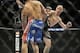 Donald Cerrone (right) lands a fight-ending kick on Adriano Martins