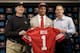 Jim Harbaugh and Trent Baalke with Eric Reid the 49ers' 2013 first-round draft pick.