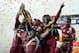 All smiles: West Indies celebrate winning the World T20 in 2012, but where are the Calypso Kings ranked now in our new-look global standings?