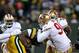 Leader in the trenches Justin Smith (No. 94) helped negotiate his own contract.