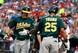 Seth Smith is met by Chris Young, both of whom will play elsewhere in 2014.