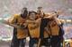 Smiles better: Liverpool celebrate their 2001 FA Cup final win over Arsenal