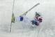 Russian moguls skier Sergey Volkov bites the snow during one of his runs.