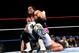 Bret Hart puts Shawn Michaels in the Sharpshooter.