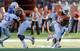 In 2014, Swoopes (right) gets his shot to take command of the quarterback position.