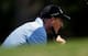 Jim Furyk spends a great deal of time on the greens.