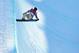 Kaitlyn Farrington hangs in the air over the snowboard halfpipe. Farrington won the gold medal in the event.