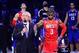 David Stern (front left) and Chris Paul (front right)