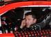 Tony Stewart in his car before practice for the Daytona 500 auto race at Daytona International Speedway in Daytona Beach, Fla., Saturday, Feb. 15, 2014. (AP Photo/David Graham)