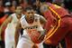 Oklahoma State point guard Marcus Smart guards Iowa State point guard DeAndre Kane.