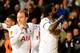 Christian Eriksen and Emmanuel Adebayor played leading roles in Tottenham's comeback win over Dnipro in the Europa League.