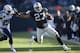 OAKLAND, CA - NOVEMBER 24: Rashad Jennings #27 of the Oakland Raiders rushes past Alterraun Verner #20 of the Tennessee Titans during the second quarter at O.co Coliseum on November 24, 2013 in Oakland, California. (Photo by Jason O. Watson/Getty Images)
