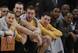 A little extra time on the bench could do Curry (far left) wonders.