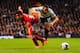 Andros Townsend battles it out with Cardiff right-back Fabio.