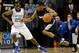Providence point guard Bryce Cotton (right) drives to the basket against Kentucky in December.