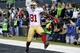 Anquan Boldin signed a two-year $12 million contract to stay with the 49ers.