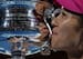 Li Na kisses 2014 Australian Open trophy.