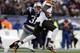 Cornerback Aqib Talib (left) needs only to turn on the tape of his performance against Browns wideout Josh Gordon for an example of why teams may not pay him top dollar.