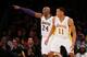 Kobe Bryant gives out instructions.