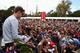 Sebastian Vettel signs autographs before the 2013 Australian Grand Prix.