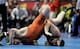Rosholt (orange) has gone from wrestling phenom to MMA prospect.
