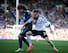 Cauley Woodrow (right) tangles with Fabricio Coloccini