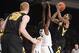 Xavier's Semaj Christon (center) and Iowa's Roy Devyn Marble (right) highlight the NCAA tournament's First Four in Dayton.