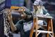 Adreian Payne and Princess Lacey cut down the net in Indy after MSU's 69-55 B1G tourney title game win over Michigan.