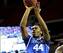 Mar 16, 2014; Atlanta, GA, USA; Kentucky Wildcats center Dakari Johnson (44) shoots against the Florida Gators during the first half in the championship game for the SEC college basketball tournament at Georgia Dome. Mandatory Credit: Dale Zanine-USA TODA