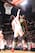 Asik blocks the former slam dunk champion Jeremy Evans.