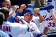 Terry Collins, center, manager of the New York Mets