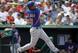 Ruben Tejada, shortstop, taking a swing.