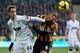 Hull City's Curtis Davies beats Manchester United midfielder Adnan Januzaj to the ball.