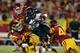 Scott Starr (top left) is poised to have a more active role in Justin Wilcox's defense.