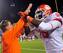 Head coach Dabo Swinney and projected starting left tackle Isaiah Battle